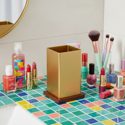 Gold organizer on vanity