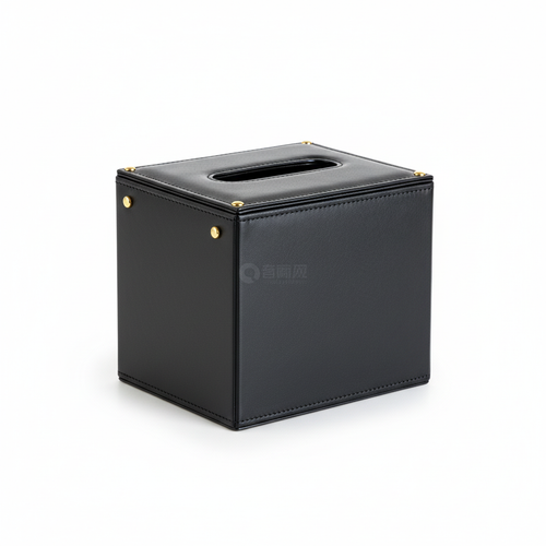 Black leather tissue box cover with gold rivets on white background